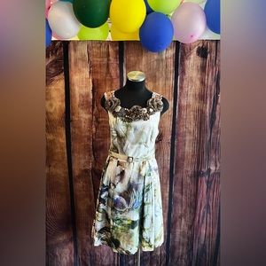 Floral midi dress with flowers and beads along the neckline